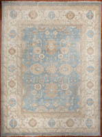 Traditional Oushak design in shades of light blue, ivory, soft gold and salmon