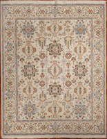 Classic Persian Bakshahish carpet design on an ivory background decorated with soft tone colors.
