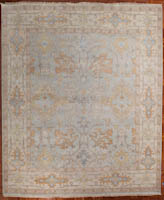 Classic floral Oushak design soft blue and ivory predominate 